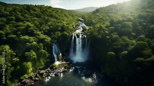 Arial shot of falls in a beautiful green forest , aerial shot, falls, beautiful green forest