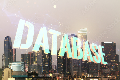 Double exposure of Database word sign on Los Angeles city skyline background, global research and analytics concept