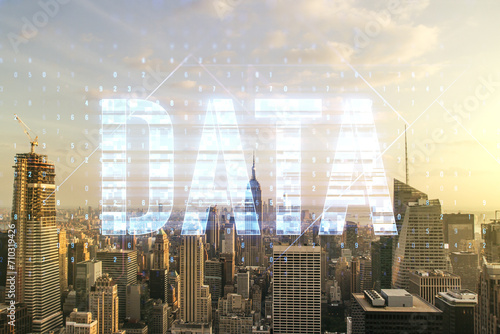 Data word hologram on New York city office buildings background, big data and blockchain concept. Multiexposure