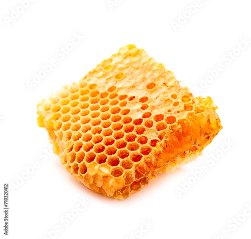 Honeycomb with honey on white backgrounds