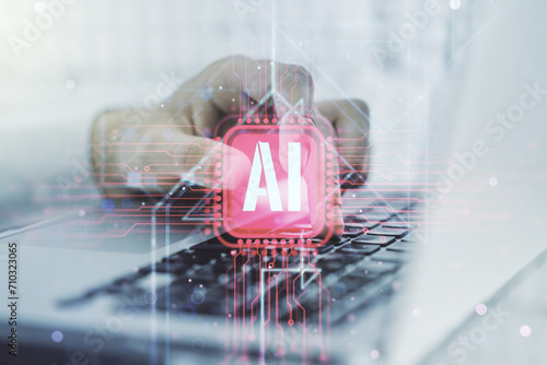 Creative artificial Intelligence symbol concept with hands typing on computer keyboard on background. Double exposure photo