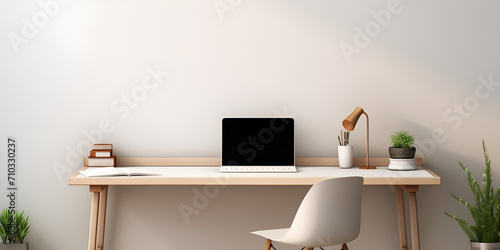 Workplace with computer and plant on wooden table light and white. Contemporary Office Desk with Plant Decor photo