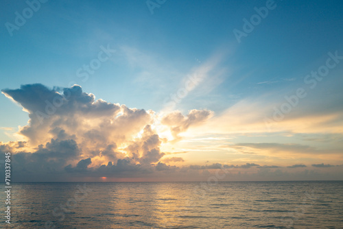 Dramatic sunset sky. sea. Calm sea with sunset sky through the clouds over. Meditation ocean and sky background. Tranquil seascape. Horizon over the sunset sea water. Calm sea with sunset sky.