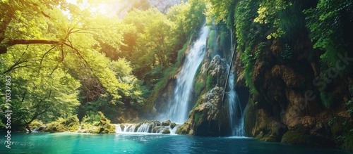 Beautiful waterfall cascading in a scenic landscape.