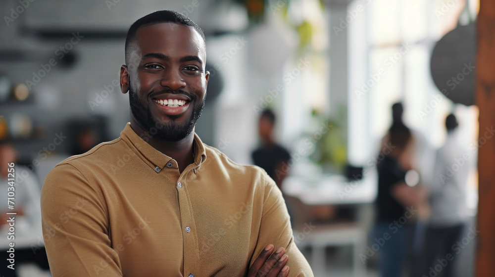 Portrait of a handsome smiling black businessman boss standing in his modern business company office. Portrait of a handsome smiling black businessman boss standing in his modern business company office.