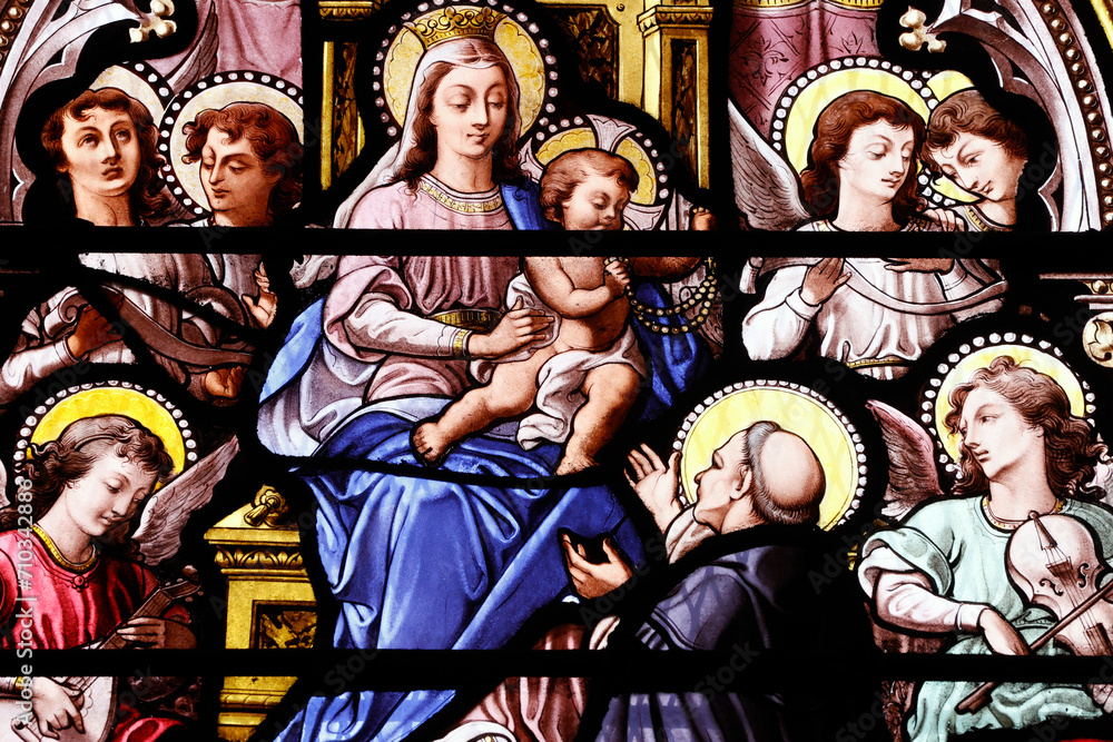 Saint Leonard church.  Stained glass. Saint Dominic receiving the Rosary from the Virgin Honfleur. France.