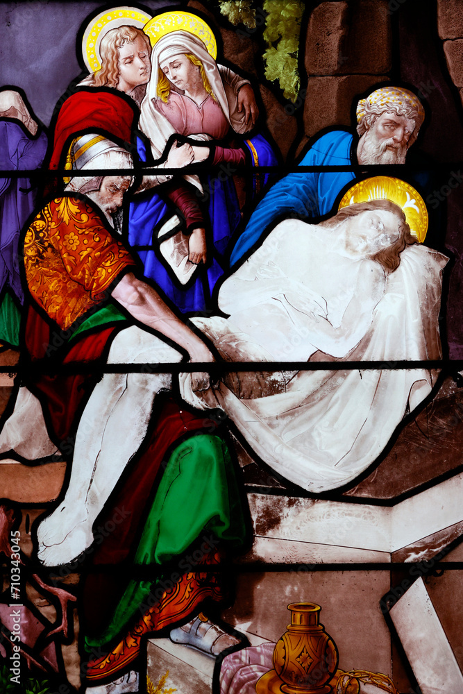 Saint Leonard church. Stained glass. Way of the cross. Station 14. Jesus is laid in the tomb.. Honfleur. France. Saint Leonard church. Stained glass. Way of the cross. Station 14. Jesus is laid in the tomb.. Honfleur. France.