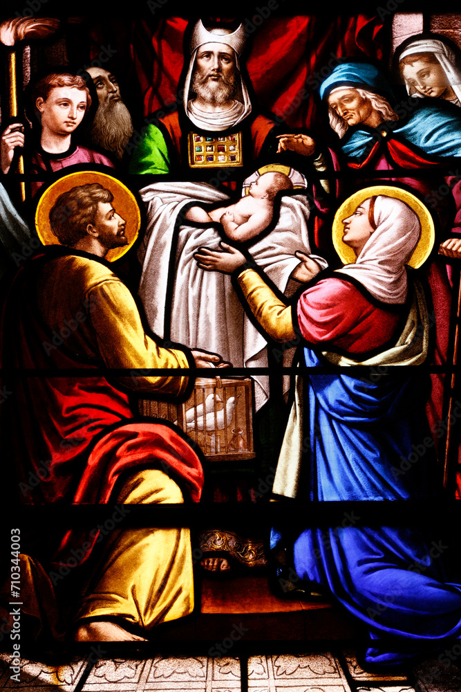 Obraz premium Saint Aubin church. Stained glass. The Presentation of Jesus at the Temple. . Houlgate. France.