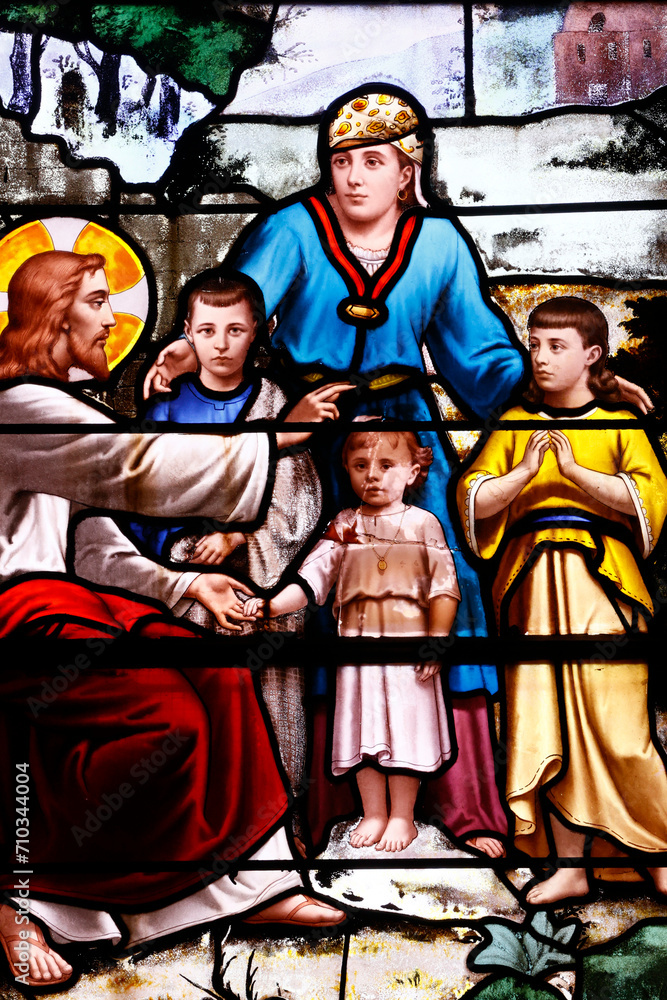 Saint Aubin church.  Stained glass. Let the Little Children Come to me. Jesus. new testament.  Houlgate. France.