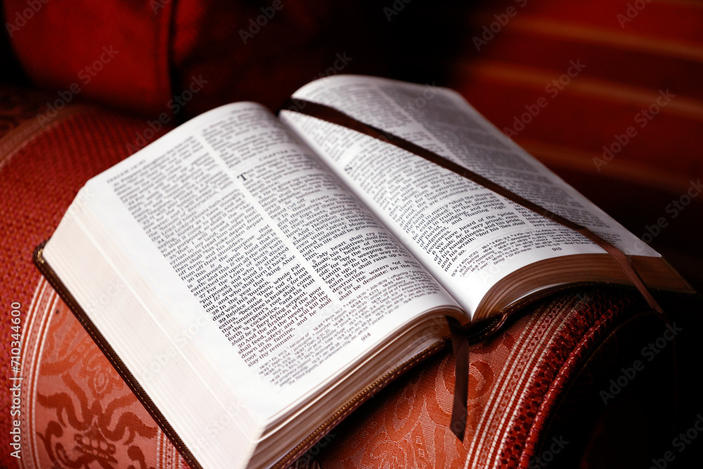 Fototapeta premium Bible study. Open bible on a chair.