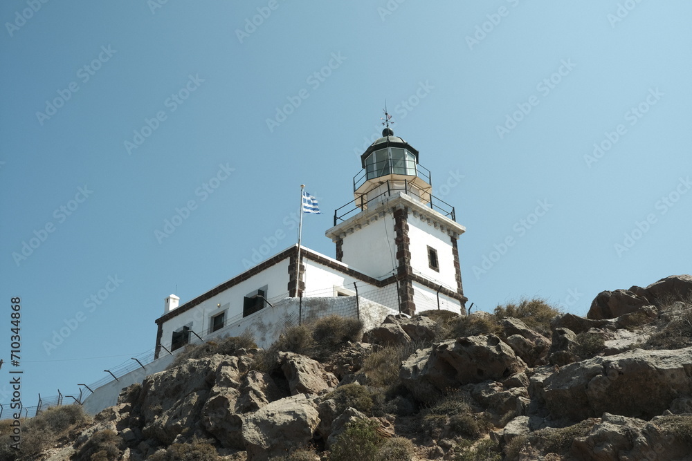 Akrotiri Lighthouse under a clear blue sky