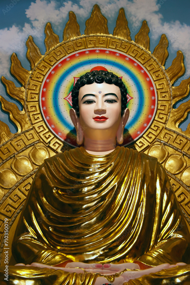 An Phuoc buddhist pagoda.  Shakyamuni Buddha sitting in the meditation pose. Statue.  Vietnam.