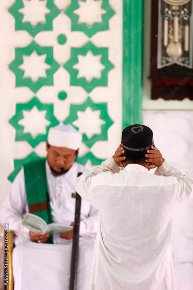 Jamiul Azhar mosque. The friday prayer (salat). Sermon by Imam. Vietnam. Jamiul Azhar mosque. The friday prayer (salat). Sermon by Imam. Vietnam.