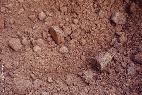 gravel or soil aggregate for road structure. background pile of dirt