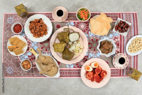 Top View Ketupat Lebaran Menu, Indonesian Celebratory Dish of Rice Cake photo