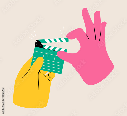 Cinematography concept. Hands holding movie clapper board. Colorful vector illustration