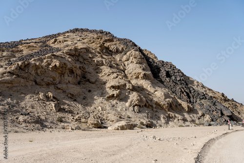  hill with barren slopes and basalt stones at Moonlandscape, near Swakopmund, Namibia