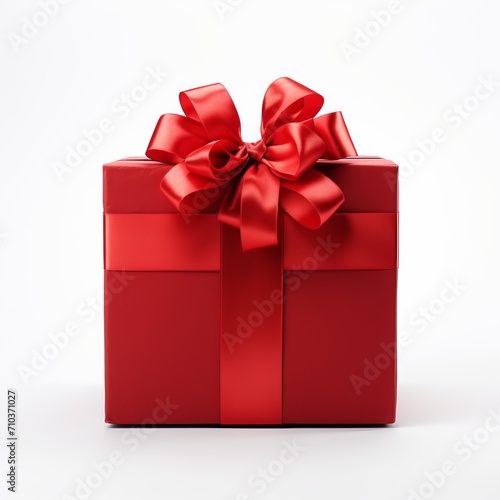 Elegantly packaged present with lovely satin ribbon on clean and minimalistic white background