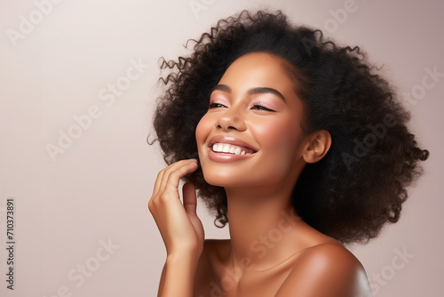 Portrait of young beautiful black African American woman with perfect smooth skin beauty spa salon concept, Smiling and touching her face, Close up, Isolated background, cosmetics model