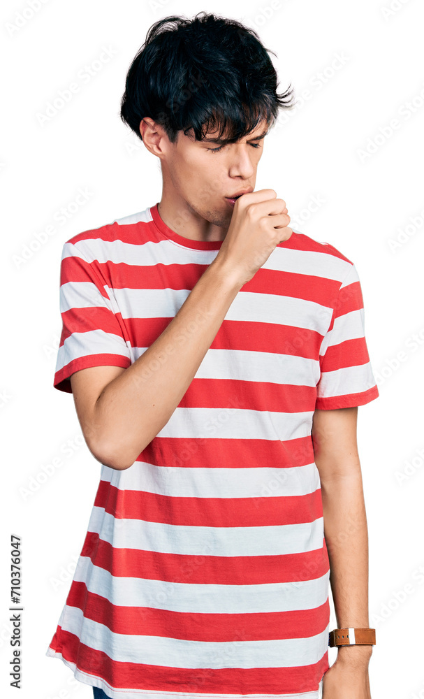 Handsome hipster young man wearing casual striped t shirt feeling unwell and coughing as symptom for cold or bronchitis. health care concept. Handsome hipster young man wearing casual striped t shirt feeling unwell and coughing as symptom for cold or bronchitis. health care concept.