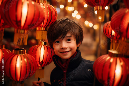 chinese young boy kid celebrate at chinese lantern festival bokeh style background