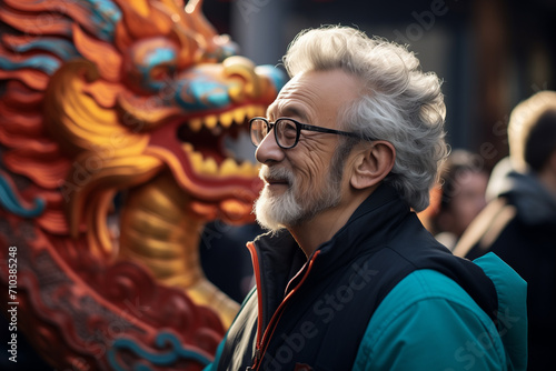 chinese old man standing beside the dragon statue bokeh style background