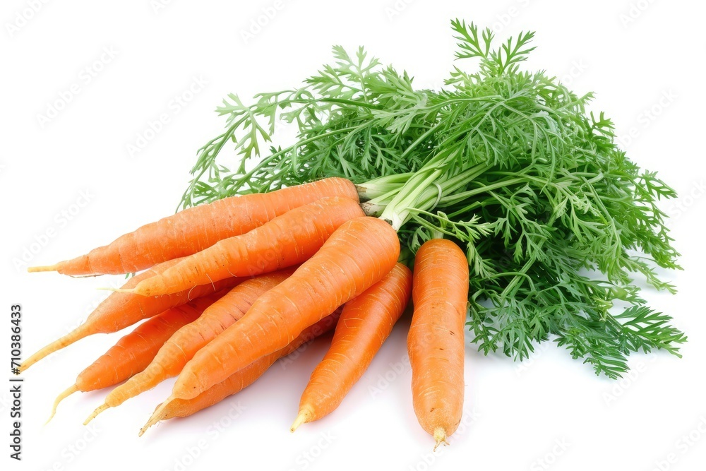 A bunch of fresh carrots with green tops, isolated on a white background A bunch of fresh carrots with green tops, isolated on a white background