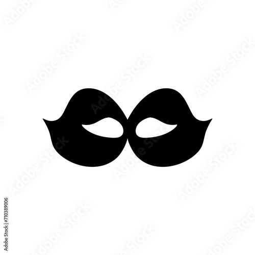 Silhouette of a masked superhero carnival villain
