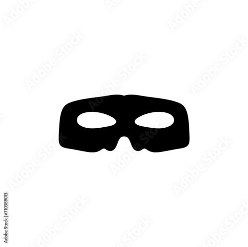 Silhouette of a masked superhero carnival villain