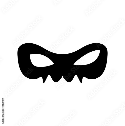 Silhouette of a masked superhero carnival villain