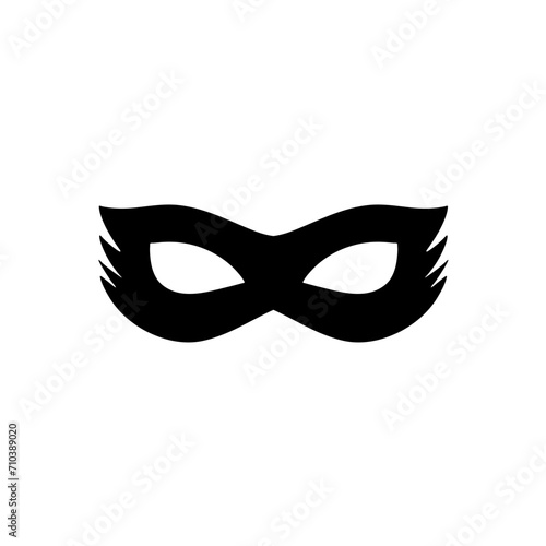 Silhouette of a masked superhero carnival villain