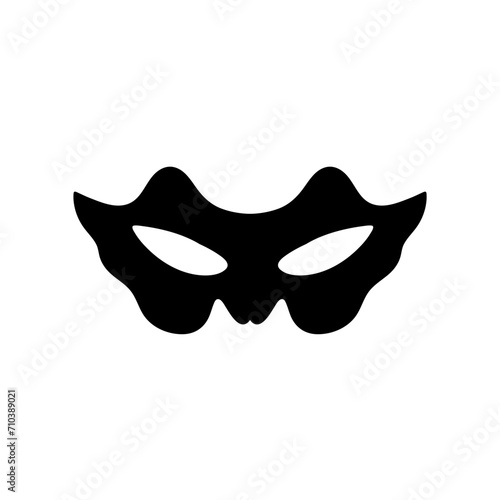 Silhouette of a masked superhero carnival villain