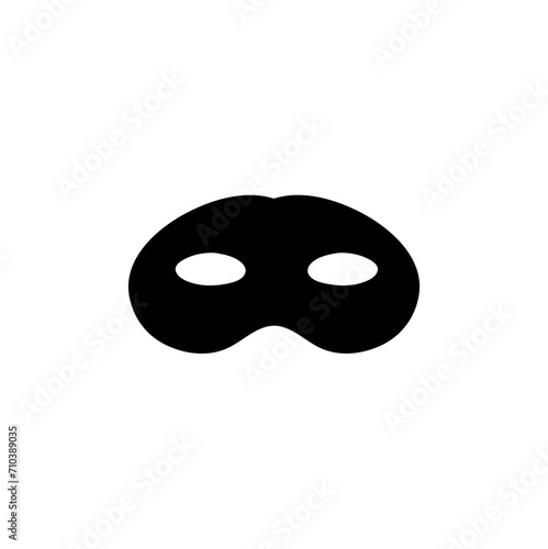 Silhouette of a masked superhero carnival villain