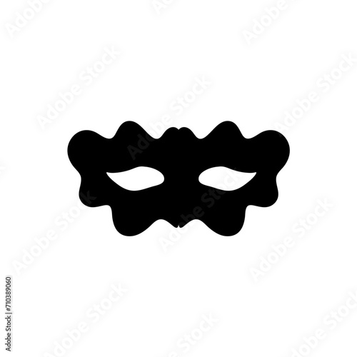 Silhouette of a masked superhero carnival villain