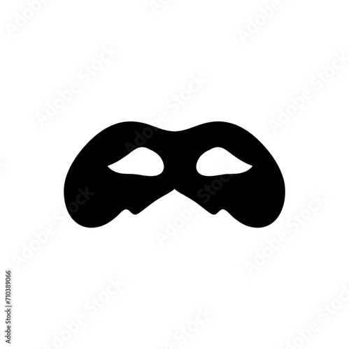 Silhouette of a masked superhero carnival villain
