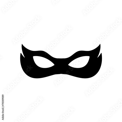 Silhouette of a masked superhero carnival villain