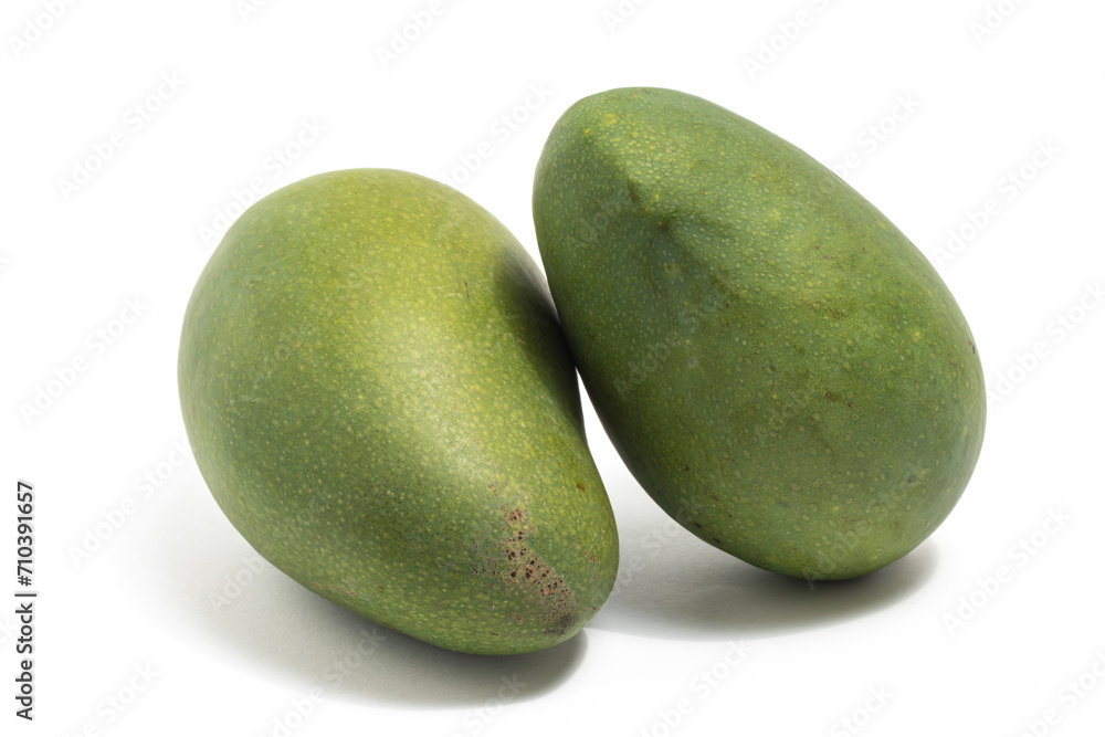 Two fresh organic green mango delicious fruit side view isolated on white background clipping path Two fresh organic green mango delicious fruit side view isolated on white background clipping path