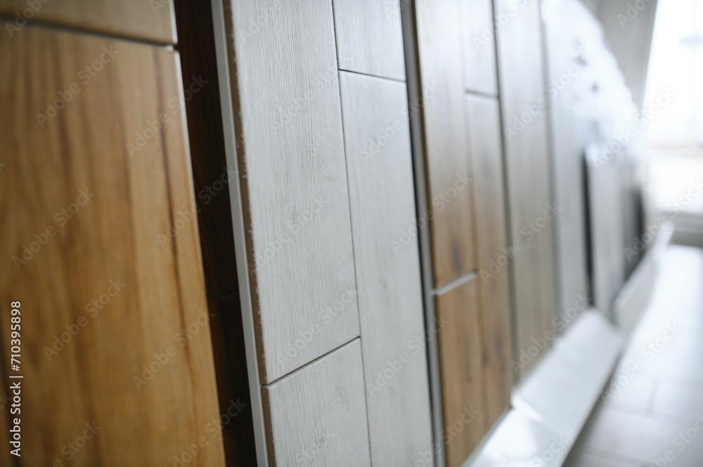 Large assortment of floor tiles or a selection at a hardware store. Repair material Large assortment of floor tiles or a selection at a hardware store. Repair material