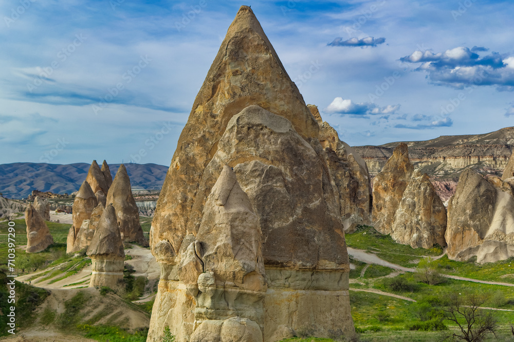 Typical Cappadocia landscape soft volcanic rock, shaped by erosion in Goreme, Turkey.