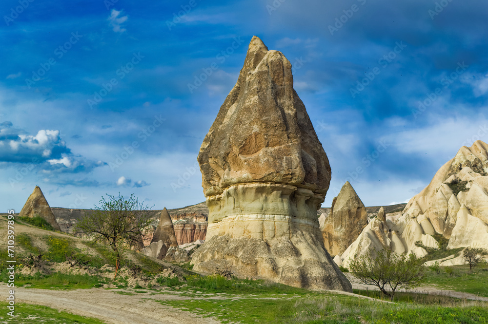 Typical Cappadocia landscape soft volcanic rock, shaped by erosion in Goreme, Turkey.