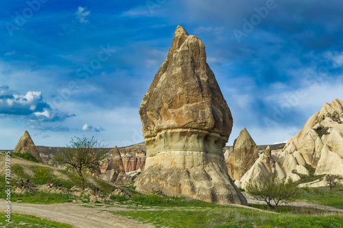 Typical Cappadocia landscape soft volcanic rock, shaped by erosion in Goreme, Turkey.