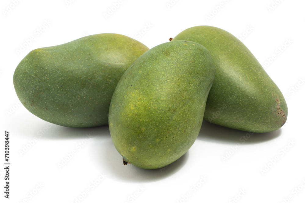 Three fresh organic green mango delicious fruit side view isolated on white background clipping path Three fresh organic green mango delicious fruit side view isolated on white background clipping path