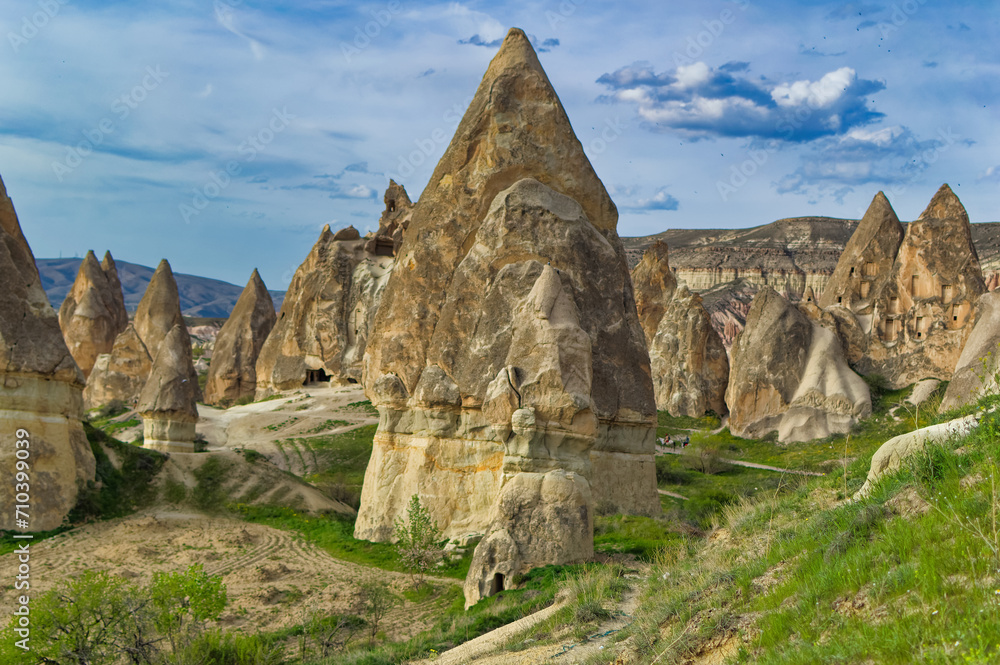 Typical Cappadocia landscape soft volcanic rock, shaped by erosion in Goreme, Turkey.