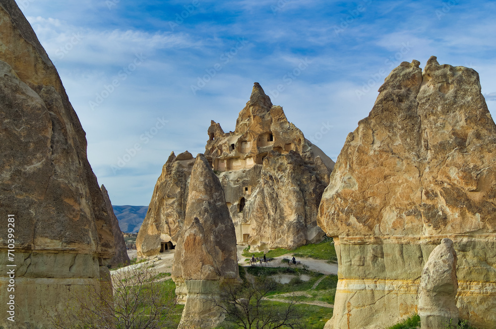 Typical Cappadocia landscape soft volcanic rock, shaped by erosion in Goreme, Turkey.