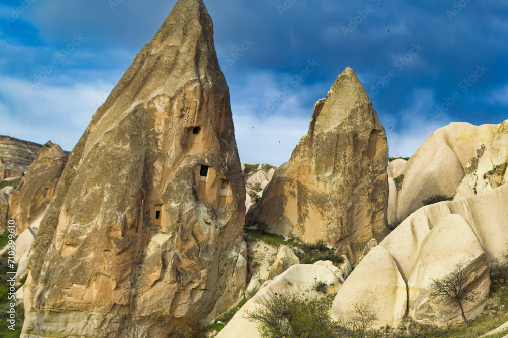 Typical Cappadocia landscape soft volcanic rock, shaped by erosion in Goreme, Turkey.