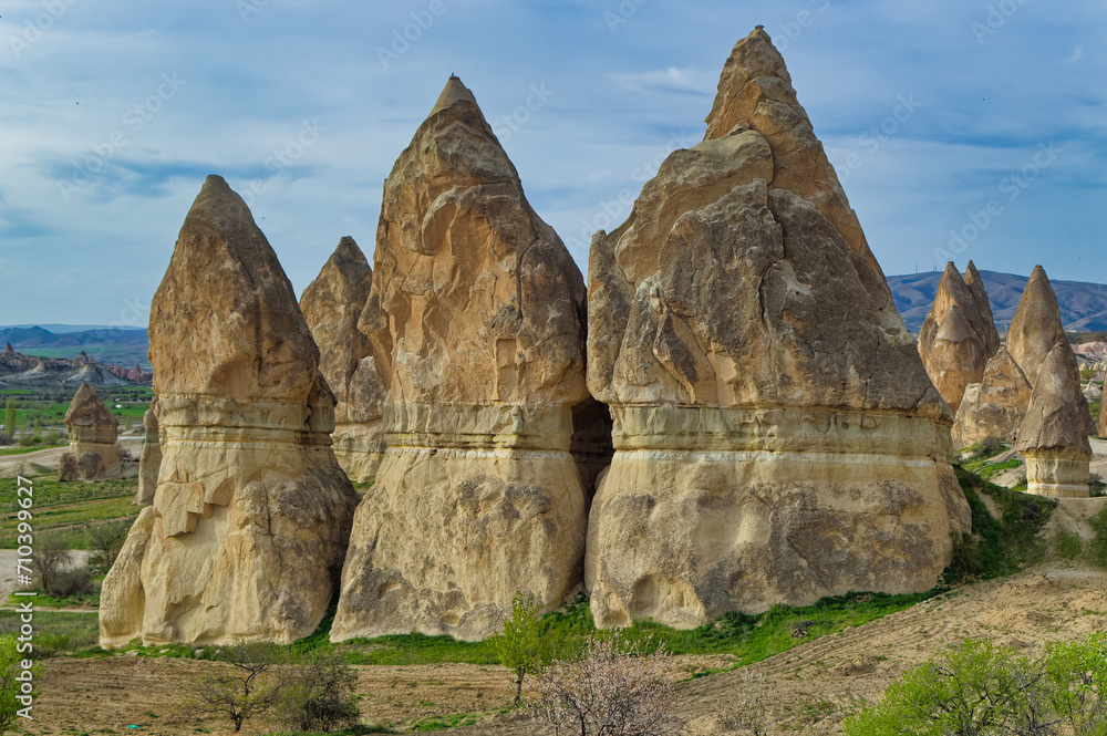 Typical Cappadocia landscape soft volcanic rock, shaped by erosion in Goreme, Turkey.