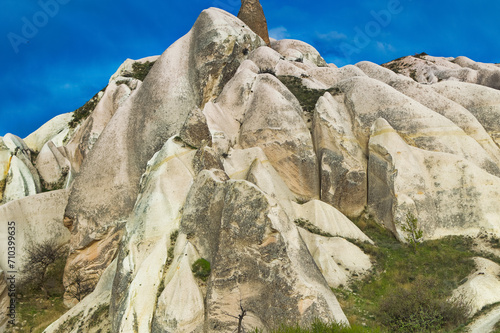 Obraz na płótnie Typical Cappadocia landscape soft volcanic rock, shaped by erosion in Goreme, Turkey. w salonie