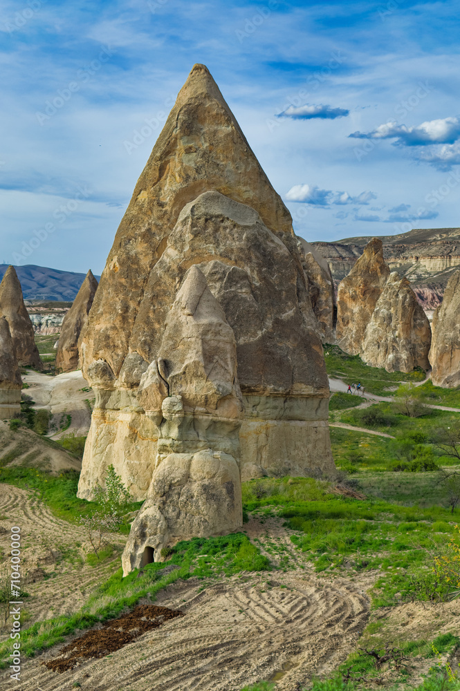 Typical Cappadocia landscape soft volcanic rock, shaped by erosion in Goreme, Turkey.