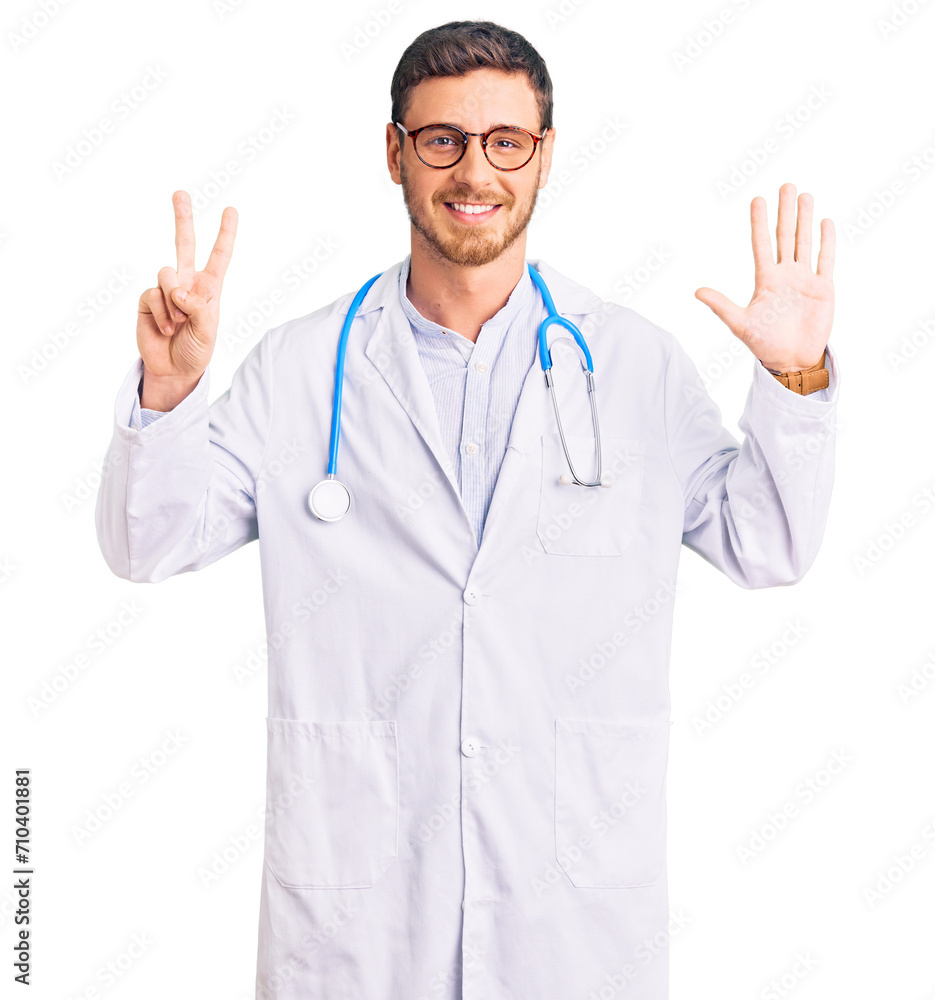 Handsome young man with bear wearing doctor uniform showing and pointing up with fingers number seven while smiling confident and happy. Handsome young man with bear wearing doctor uniform showing and pointing up with fingers number seven while smiling confident and happy.
