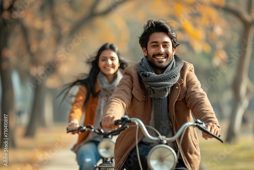 A contented Indian couple cycling in a park. Generative Ai.